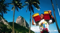 Man carries Suvinil buckets Man carries Suvinil buckets