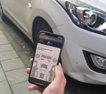 Smartphone displays RepairFix app. Smartphone displays RepairFix app.