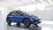 Blue car  in a modern body shop  Blue car  in a modern body shop