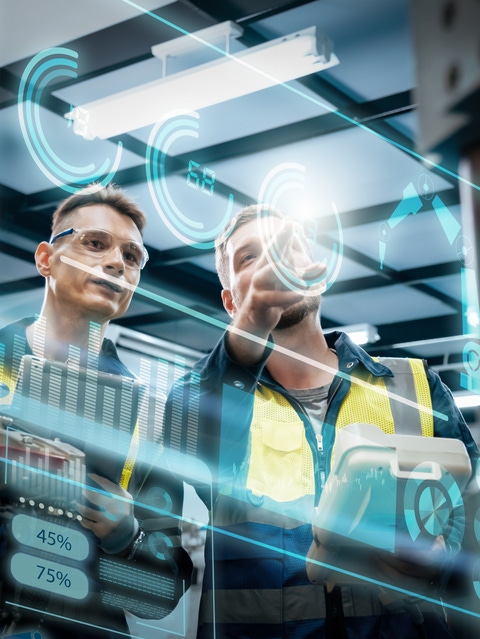Two hands holding a spectrophotometer on an orange car. Two hands holding a spectrophotometer on an orange car.