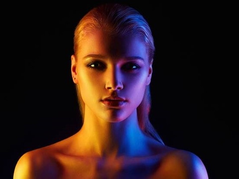 Face of a woman in different lights Face of a woman in different lights