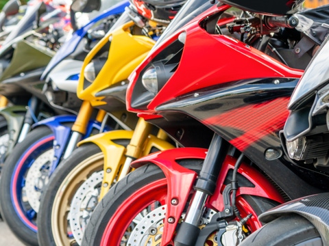 Motorcycles group parking on city street during adventure journey Motorcycles group parking on city street during adventure journey