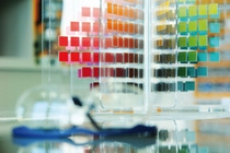 Lacquered color samples on a swivelling shelf Lacquered color samples on a swivelling shelf