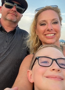 Caroline Cooper and her family taking a selfie. 