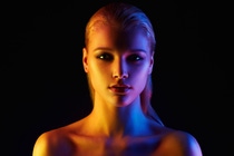 Face of a woman in different lights Face of a woman in different lights